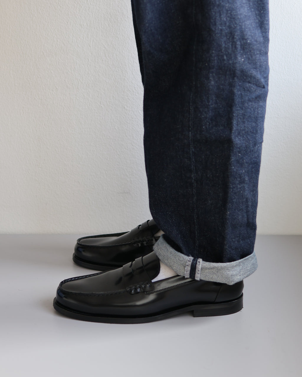 Black Polido Leather Loafer styled on feet